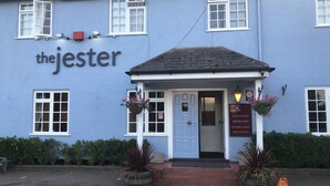 A building with the sign 'the jester' above the entrance.