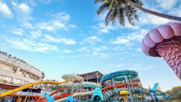 A water park with multiple slides and a pool. - Kumar Resort by Turtle, Lonavala (Mawal)