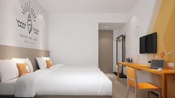 A modern hotel room with a large bed, a desk with a chair, a TV, and a wall with a decorative design.