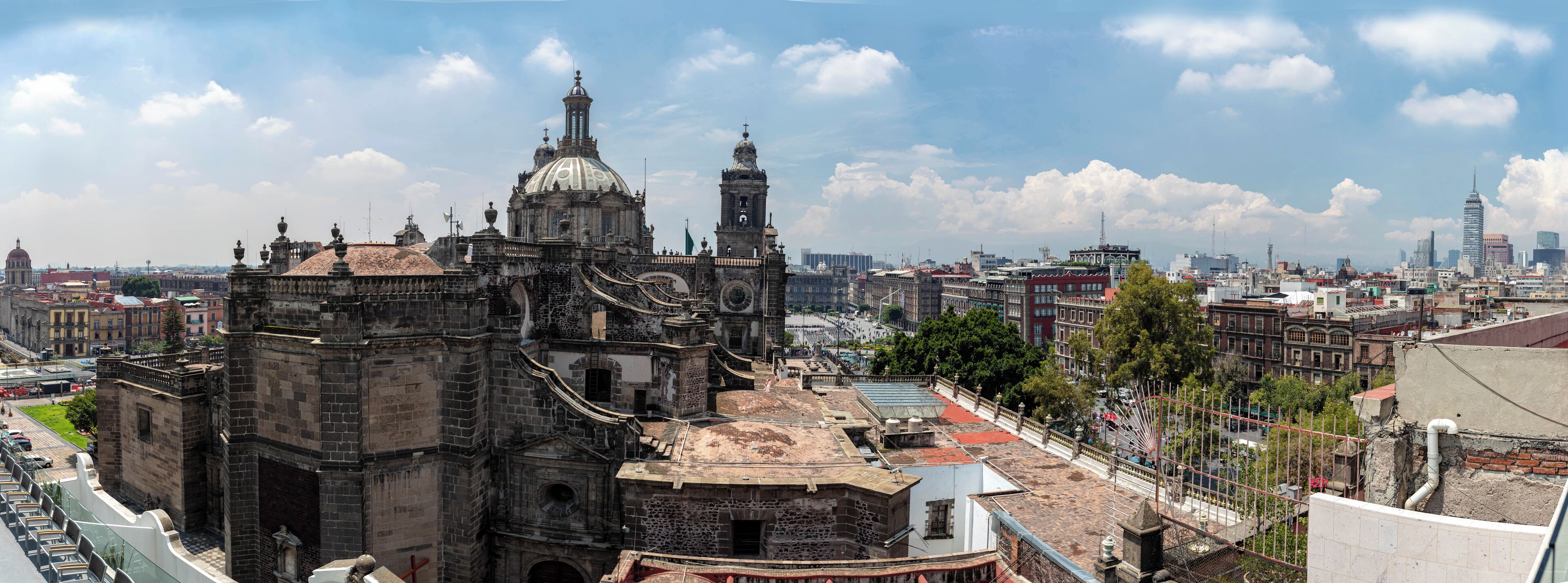 A historic cathedral with intricate architecture, a prominent dome, and a bell tower.