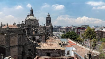 A historic cathedral with intricate architecture, a prominent dome, and a bell tower.