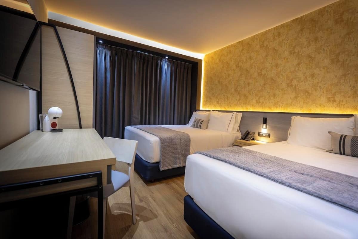 interior two bed room - pyramid tower | premium bedding, down duvets, pillow-top beds, free minibar