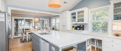 Fridge, coffee/tea maker, cookware/dishes/utensils