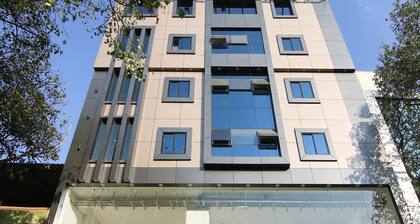 CAPITAL O 23461 Champion Lotus