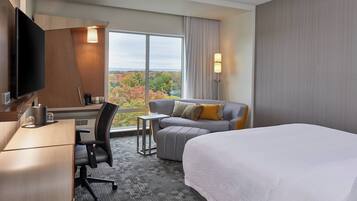 Desk, laptop workspace, blackout curtains, iron/ironing board