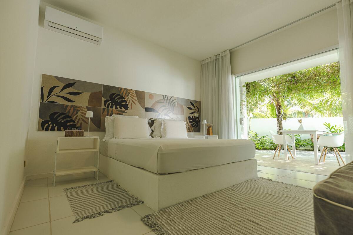 Standard Suite, 1 King Bed, Garden View | Premium bedding, pillowtop beds, minibar, blackout drapes