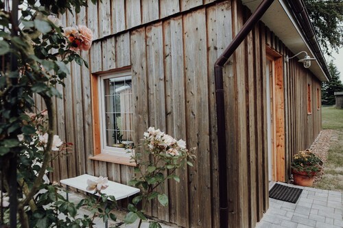 Holzhaus im Grünen mit Kamin - Lytte Hytte | Ferienhaus Wingst