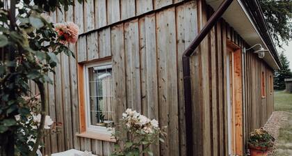 Holzhaus im Grünen mit Kamin - Lytte Hytte | Ferienhaus Wingst