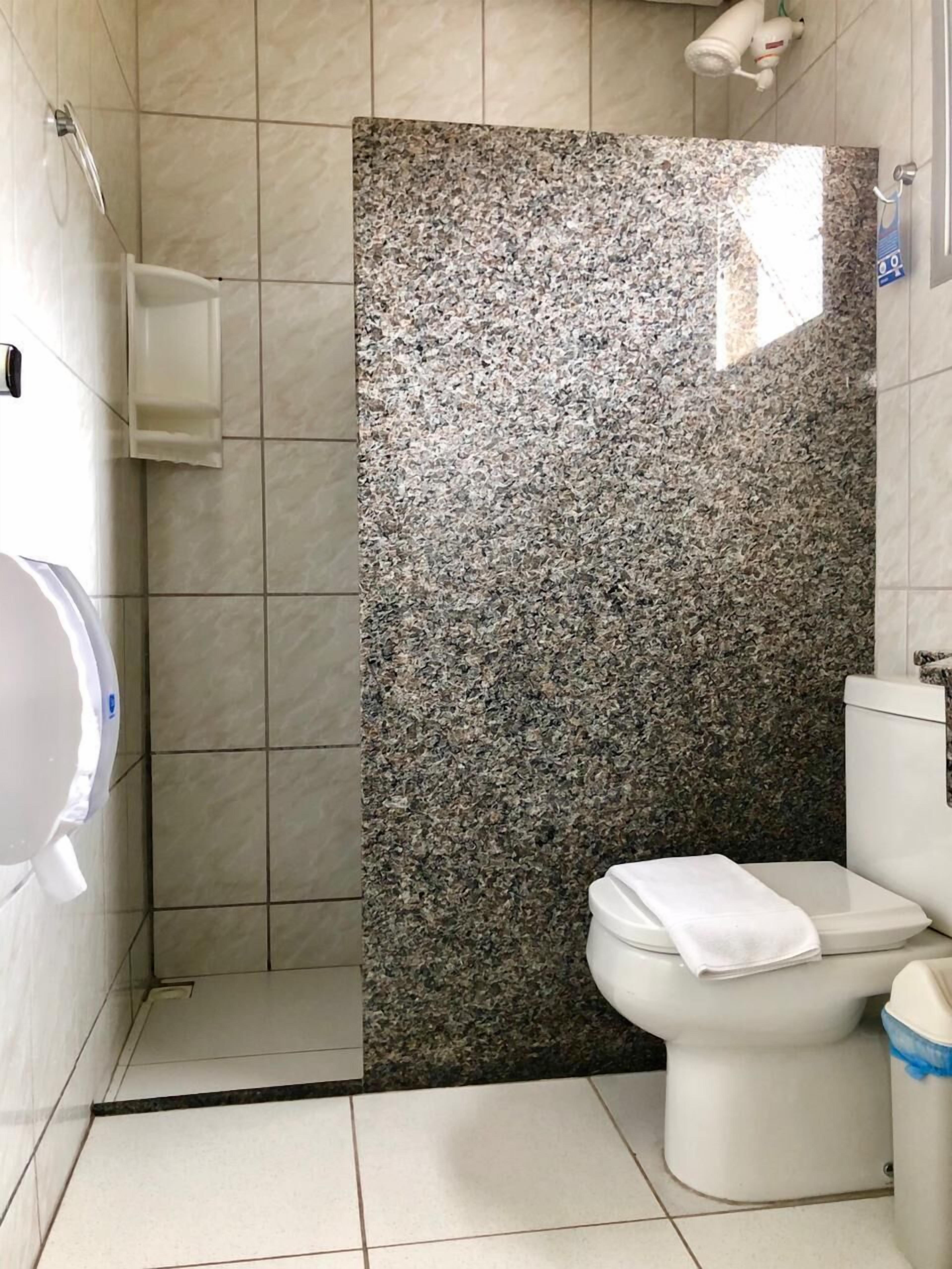 shower, towels, soap, toilet paper