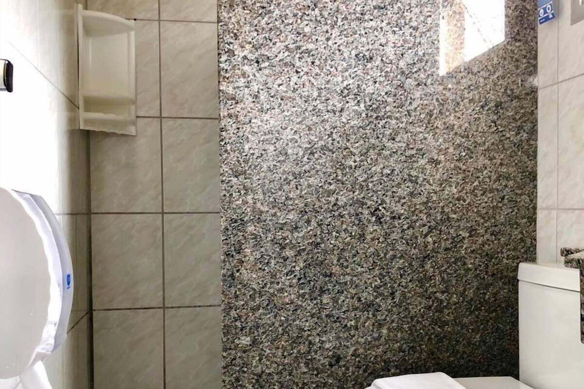 shower, towels, soap, toilet paper