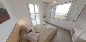 2 bedrooms, desk, iron/ironing board, travel crib