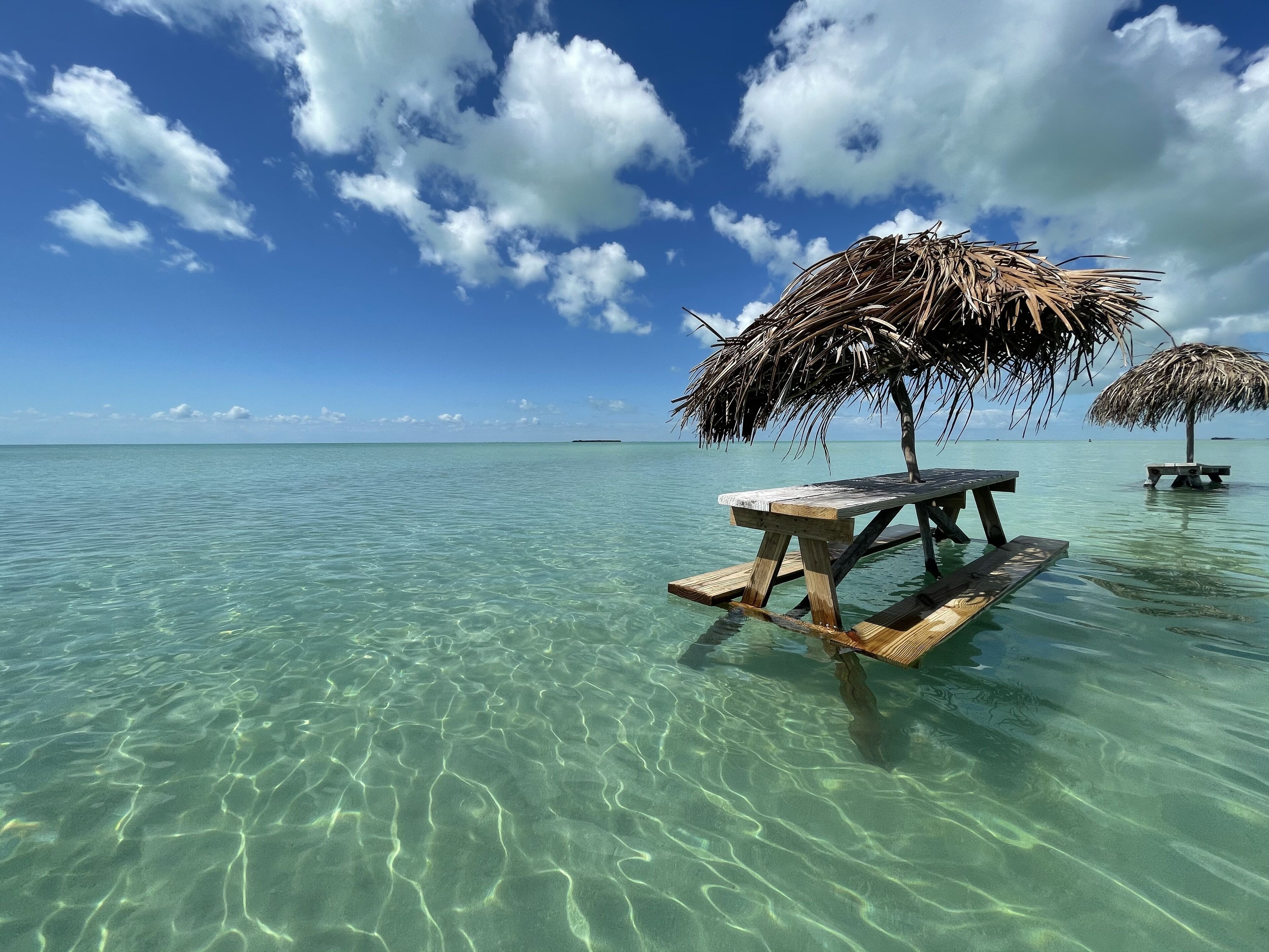 On the beach, sun loungers, beach towels