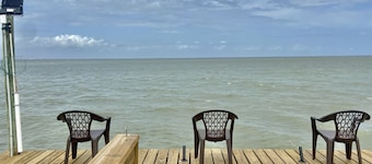 Waterfront Getaway! Relax in this waterfront home with pier on huge lot!