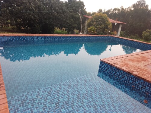 Ranch with 4 Bedrooms,Swimming pool and much green