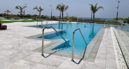 Penthouse closest to the sea with large private roof terrace, sea view, wi-fi and garage