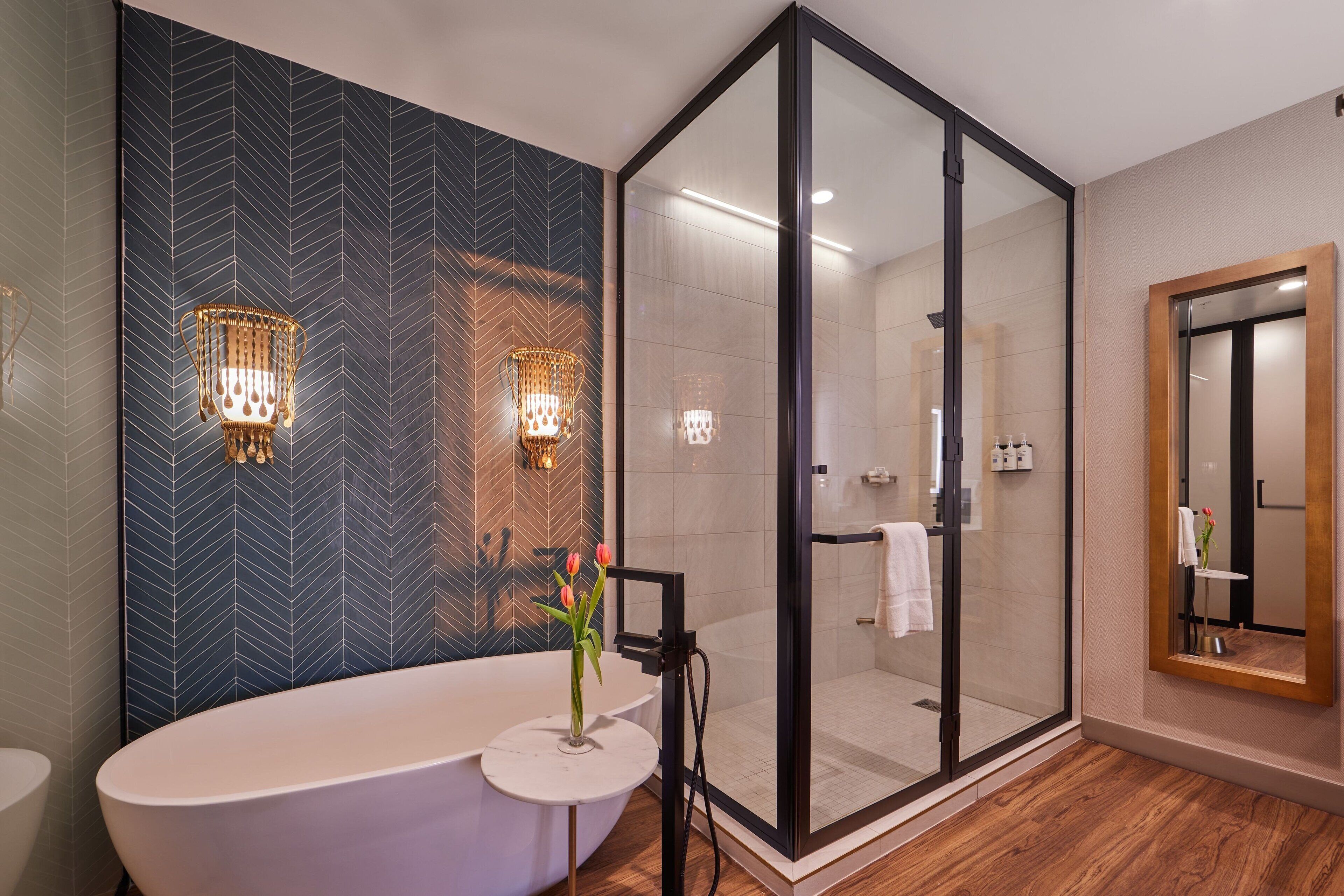 designer toiletries, hair dryer, bathrobes, slippers