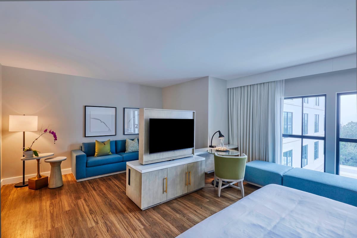 50-inch flat-screen TV with satellite channels, TV, iPad