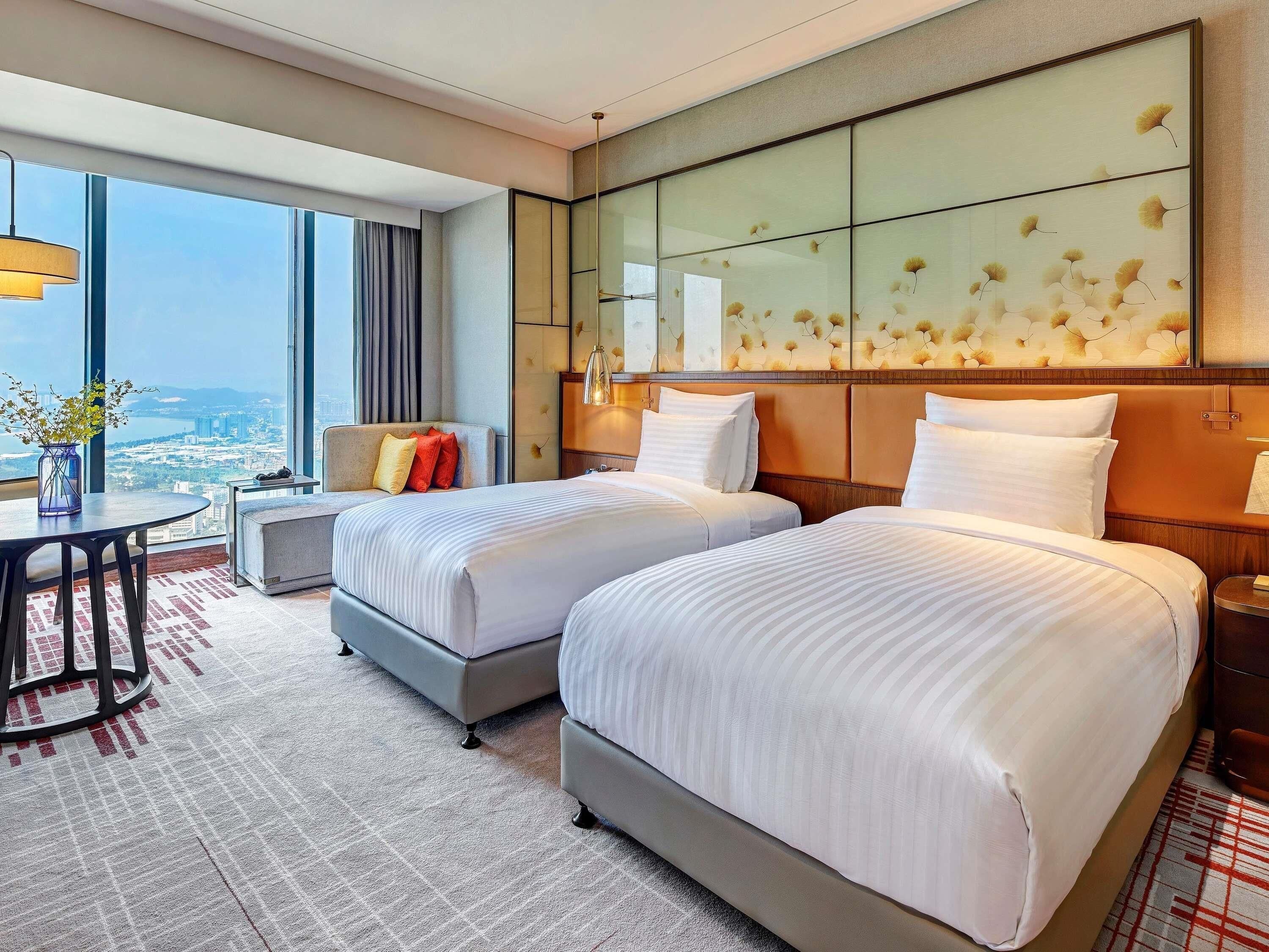 Premium bedding, down comforters, minibar, in-room safe