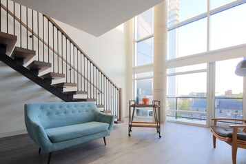 Suite, 1 King Bed, Balcony | Living area