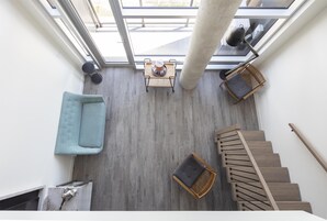Suite, 1 King Bed, Balcony | Living area | 55-inch flat-screen TV with cable channels, TV