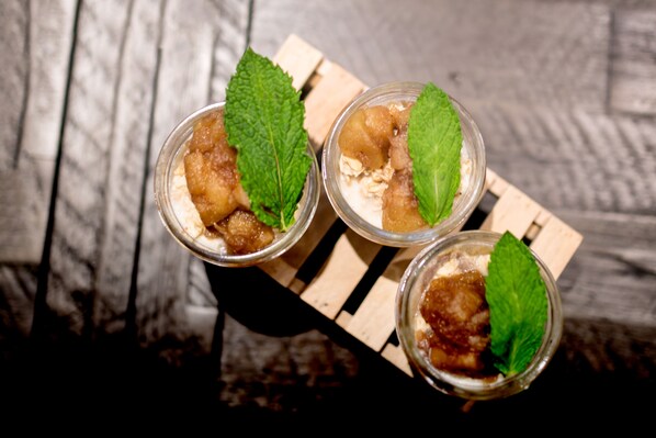Three dessert cups on a wooden board. - Canvas Moncton, Tapestry Collection by Hilton (Moncton)