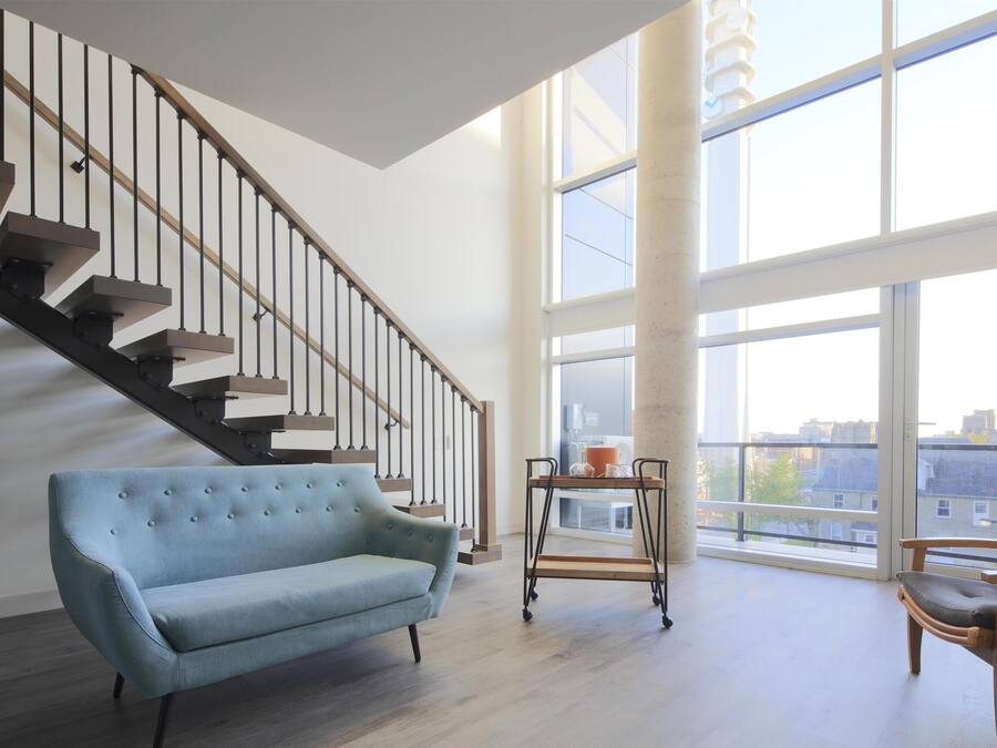 Suite, 1 King Bed, Balcony | Living area | 55-inch flat-screen TV with cable channels, TV