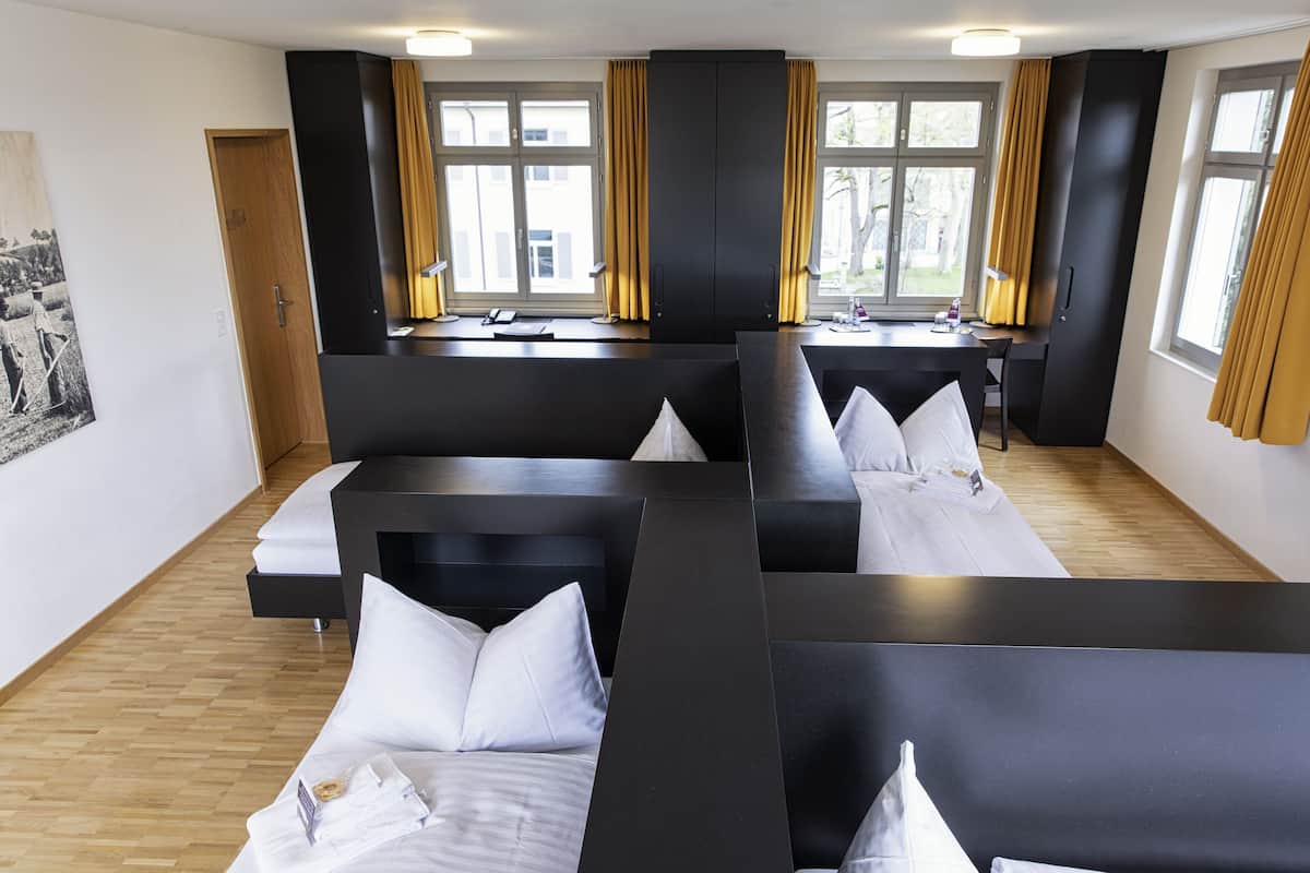 quadruple room, multiple beds, shared bathroom | 1 bedroom, hypo-allergenic bedding, desk, blackout curtains