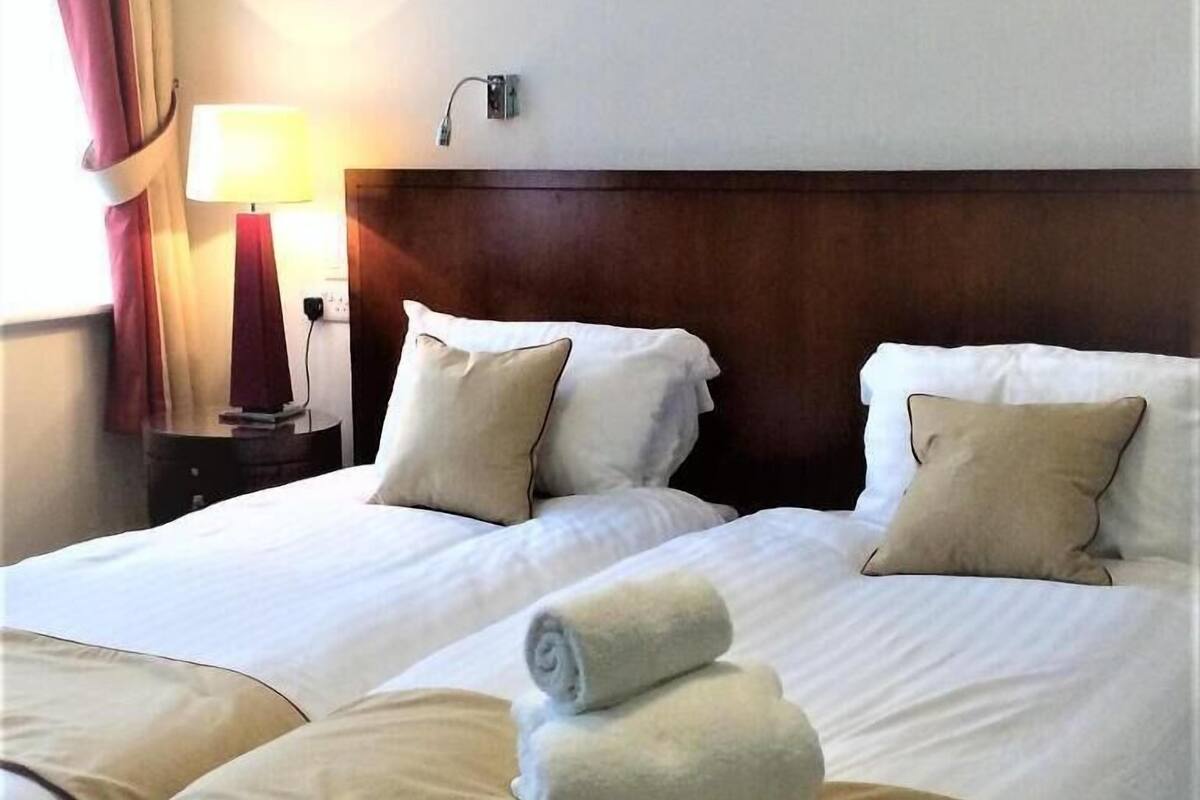 Chambre Deluxe avec lits jumeaux | Bureau, chambres insonorisées, Wi-Fi gratuit, draps fournis