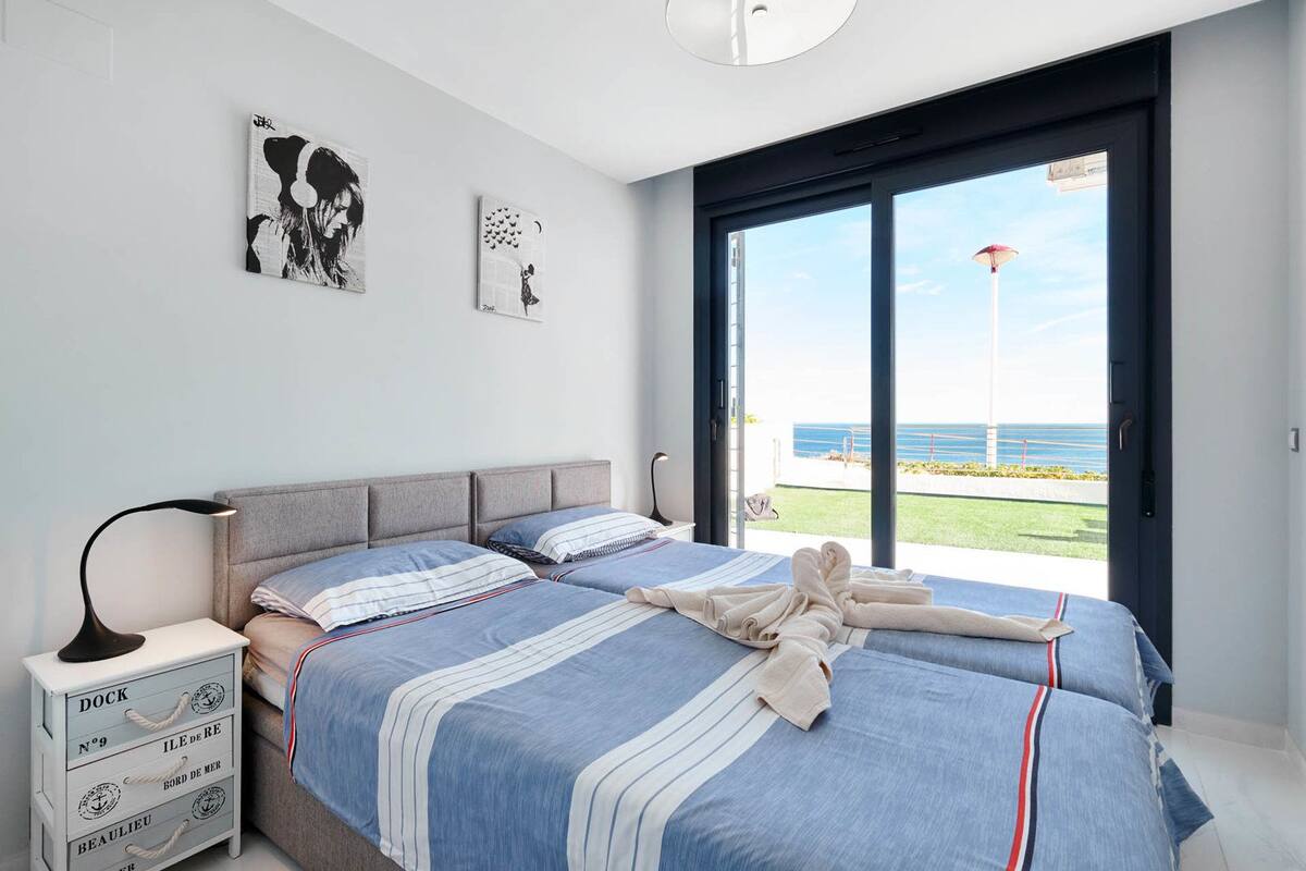apartment, 2 bedrooms, sea view | iron/ironing board, cots/infant beds, free wifi, bed sheets