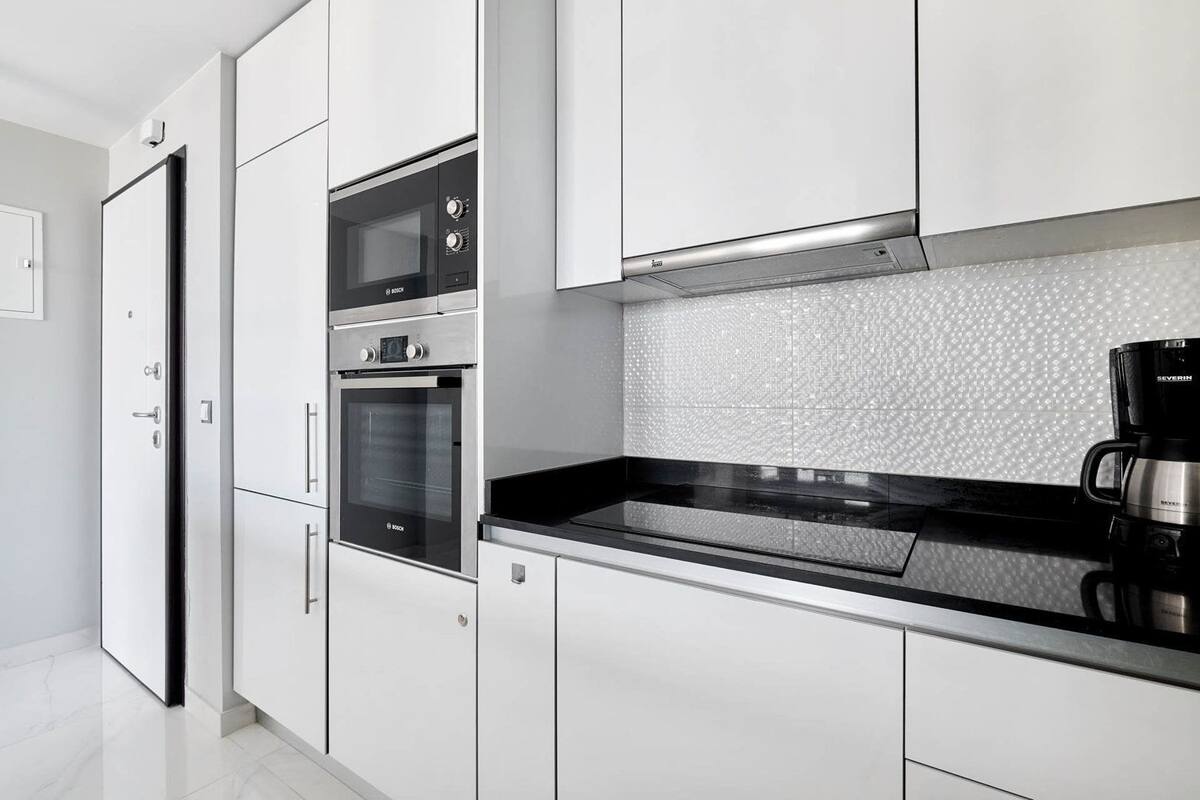apartment, 2 bedrooms, sea view | private kitchen | full-sized fridge, microwave, oven, stovetop