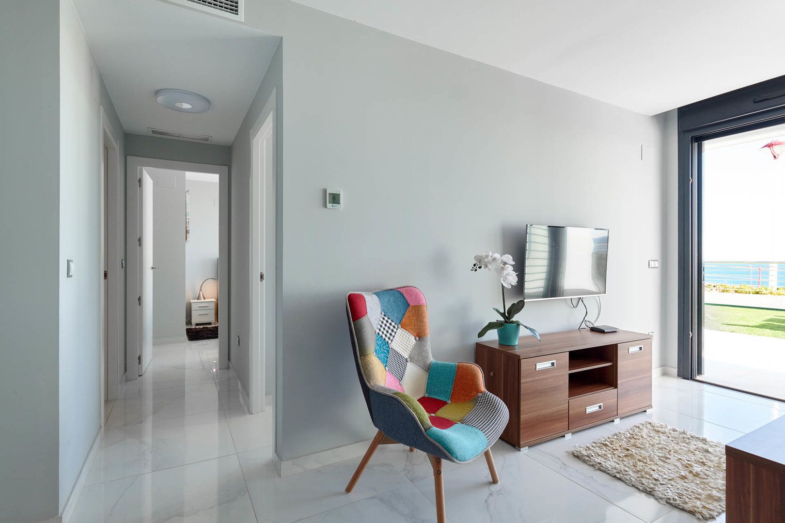 apartment, 2 bedrooms, sea view | living area | flat-screen tv