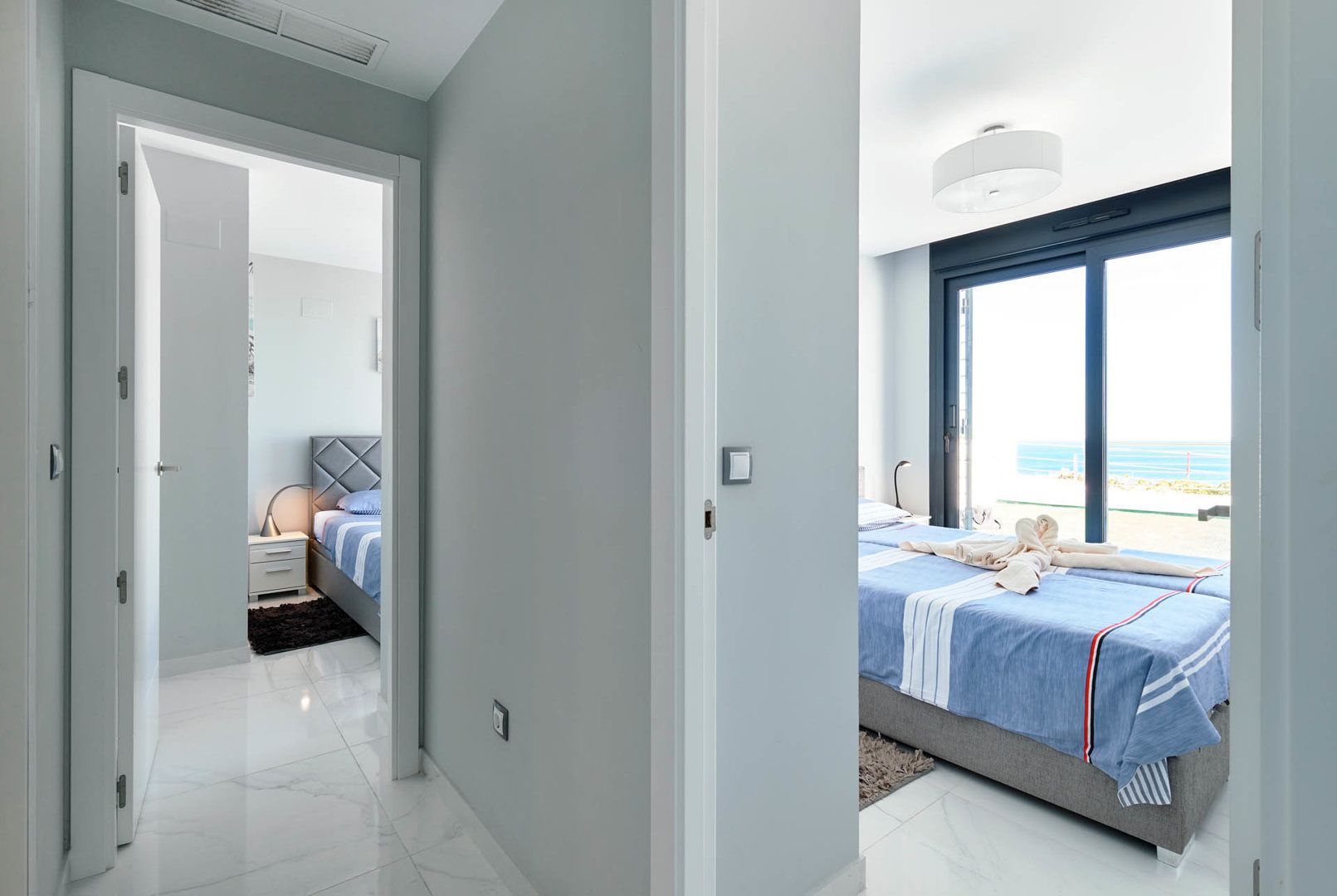 apartment, 2 bedrooms, sea view | iron/ironing board, cots/infant beds, free wifi, bed sheets