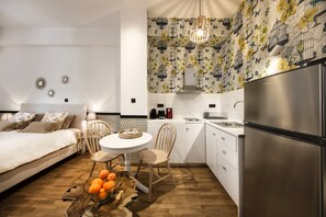 Design Studio, 1 Double Bed with Sofa bed, Non Smoking, Refrigerator | Living area | 42-inch flat-screen TV with digital channels, TV, Netflix