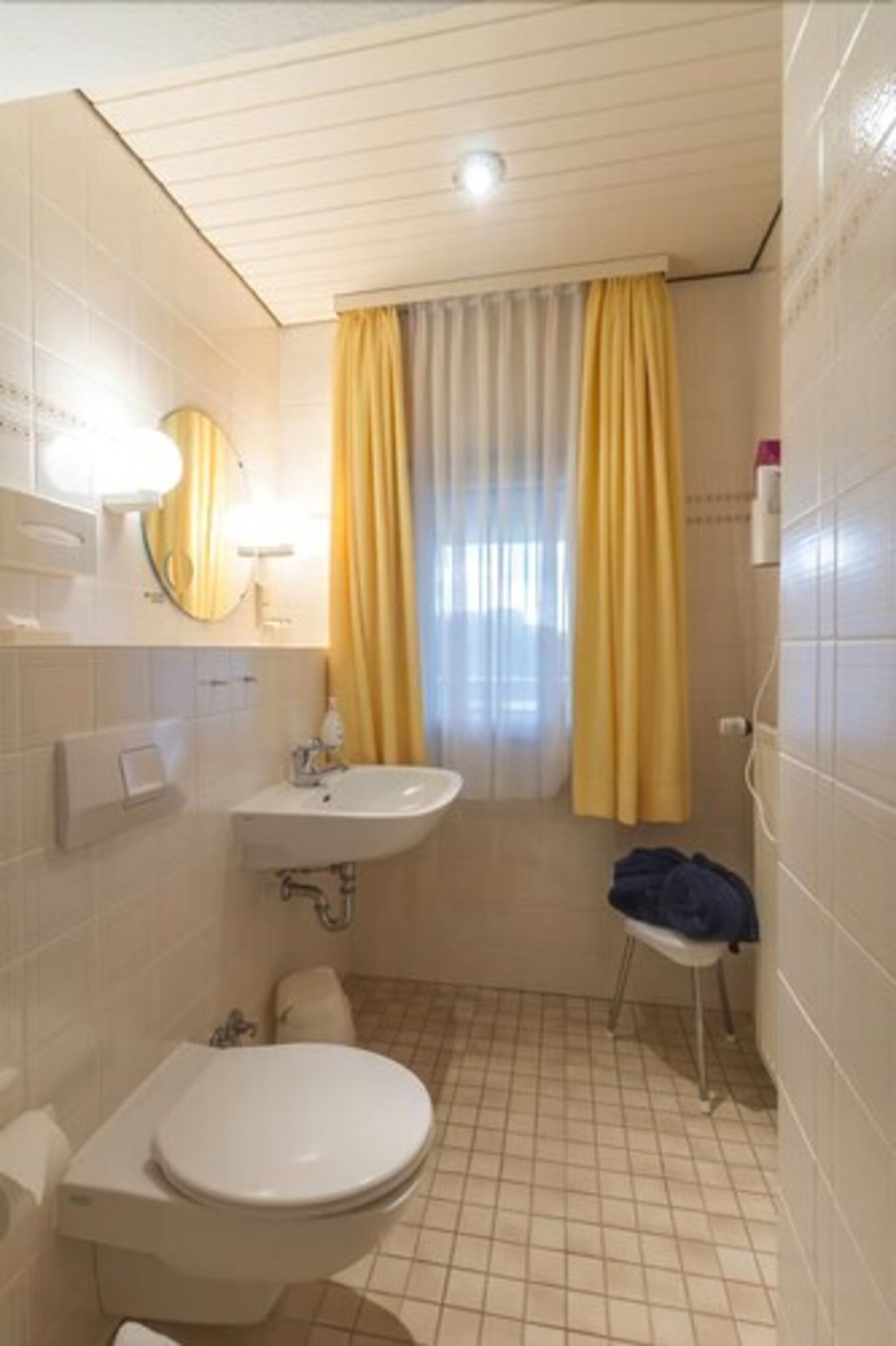 hair dryer, bathrobes, towels, soap