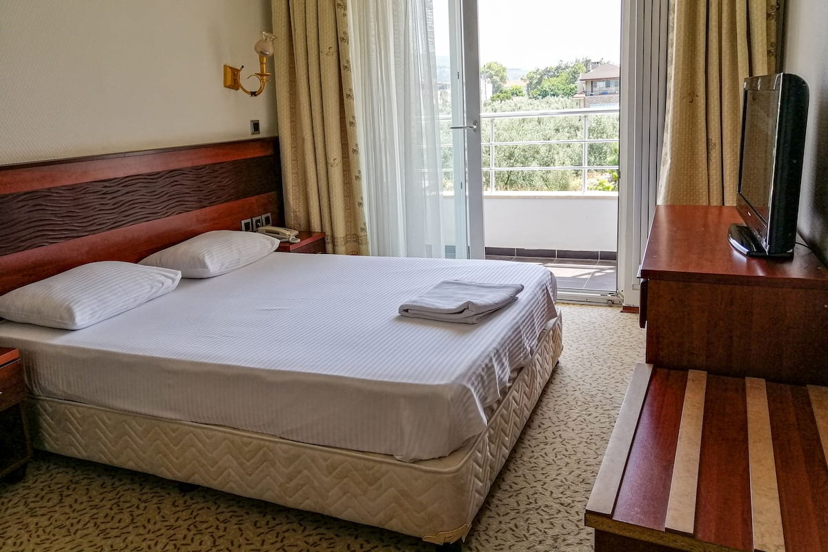 Desk, laptop workspace, blackout curtains, free WiFi