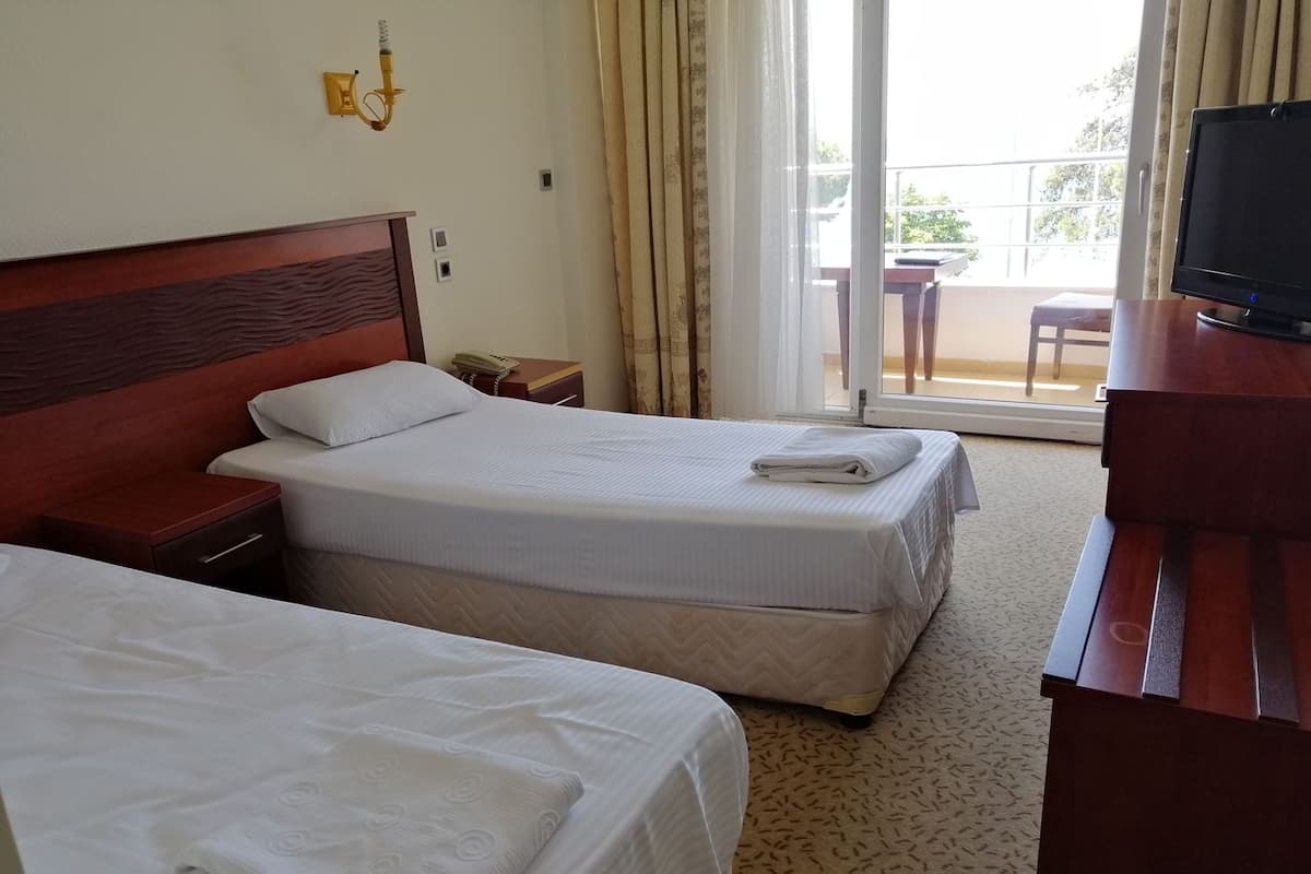 Desk, laptop workspace, blackout curtains, free WiFi