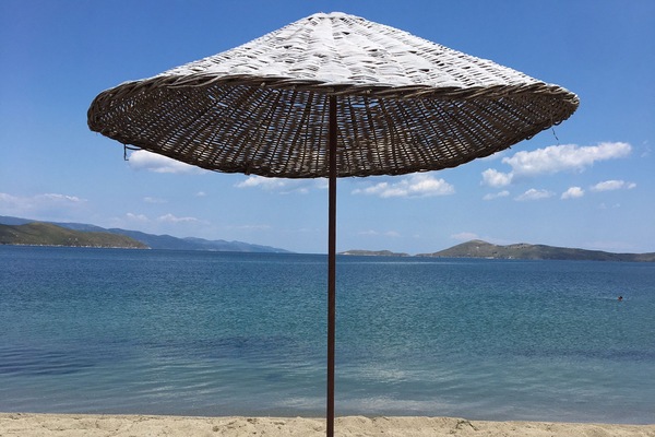 On the beach, sun loungers, beach umbrellas