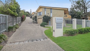 A residential building named 'The Galleries' with a gravel driveway leading to a gated entrance. - Galleries 3 - 3/28 Peregian Esplanade (Peregian Beach)