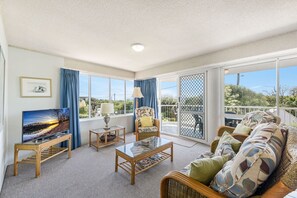 Apartment (2 Bedrooms) | Living area | 40-inch TV with cable channels - Ocean Shores 2 - 2/60-64 Peregian Esplanade (Peregian Beach)