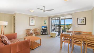 Apartment (2 Bedrooms) | Living room | 40-inch LCD TV with cable channels, TV, stereo