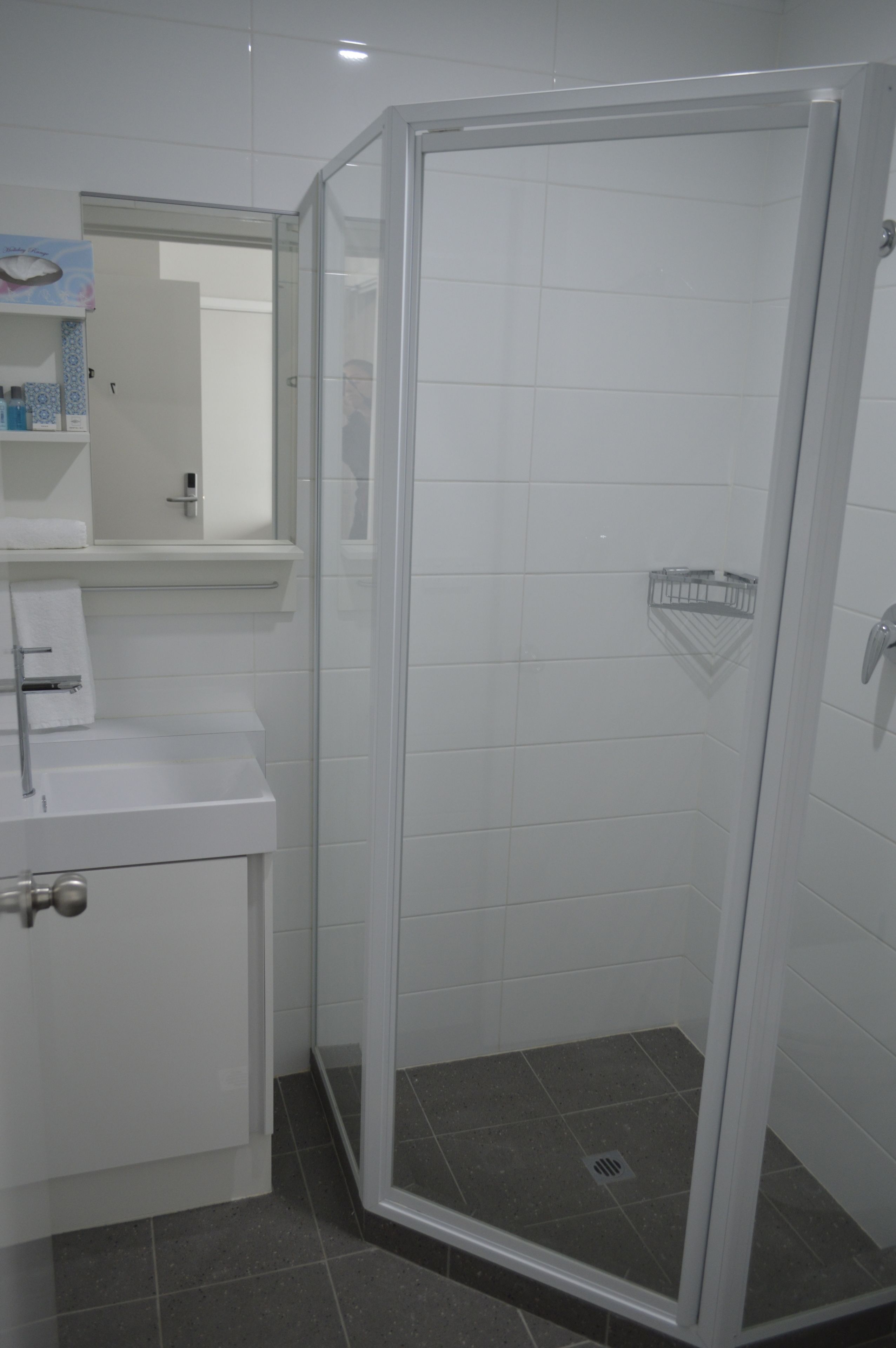 twin room | bathroom | shower, towels, soap, shampoo