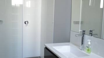 Shower, towels, soap, shampoo