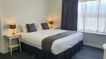Iron/ironing board, cots/infant beds