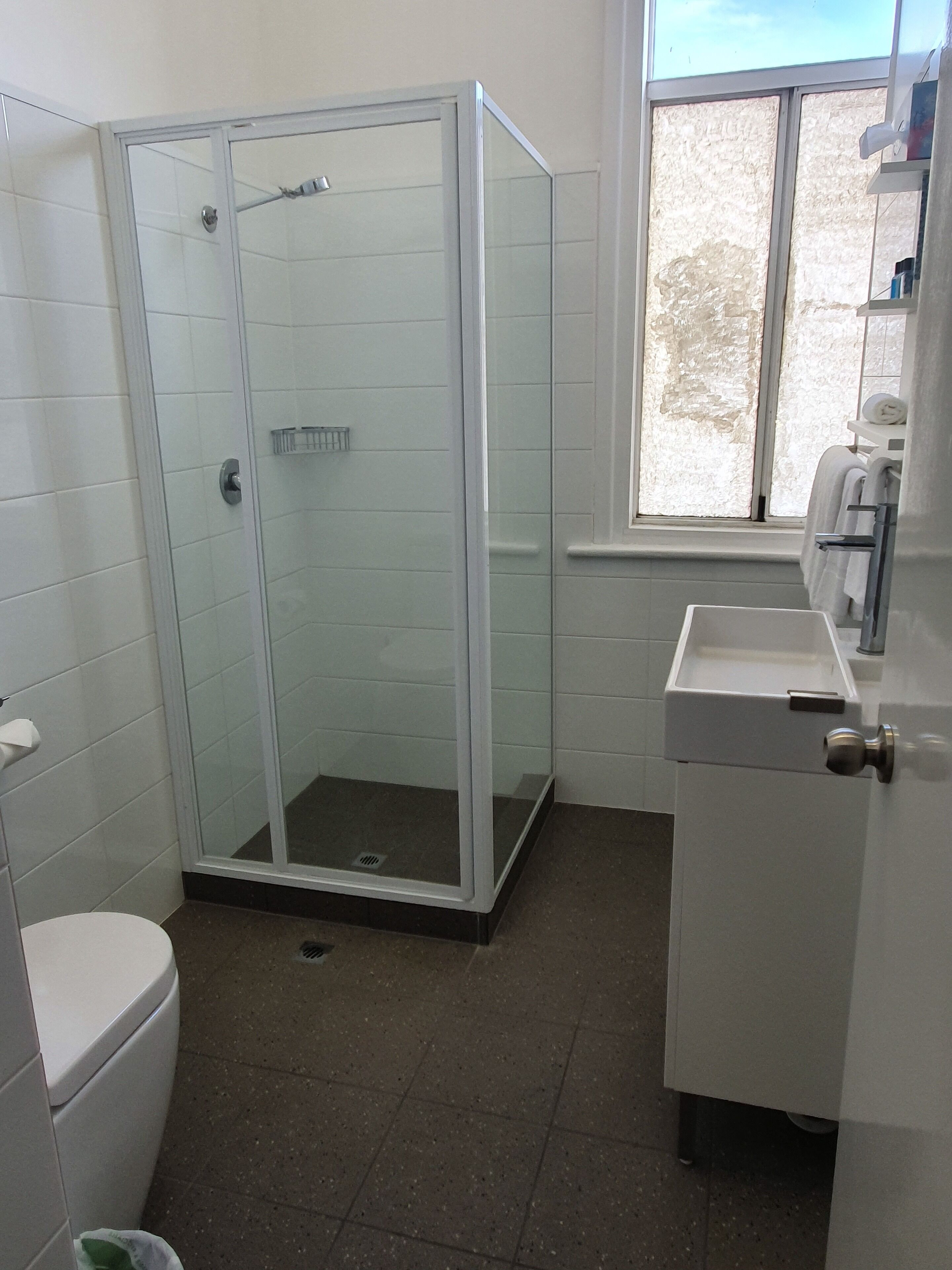 queen room | bathroom | shower, towels, soap, shampoo