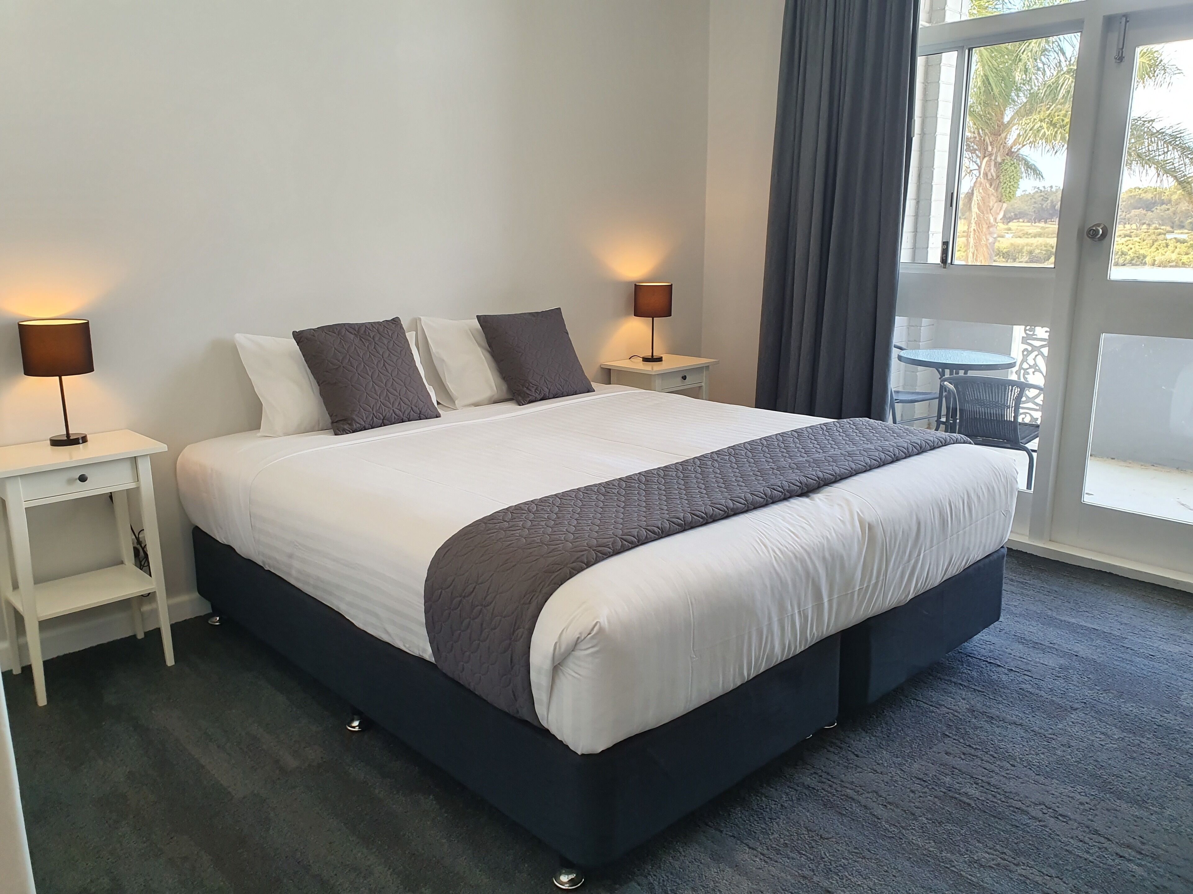 king room with balcony | iron/ironing board, cots/infant beds