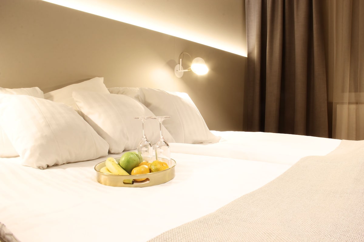 2 bedrooms, blackout curtains, iron/ironing board, cots/infant beds