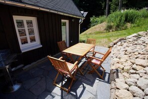 Enjoy a meal on the patio with a grill at your fingertips.