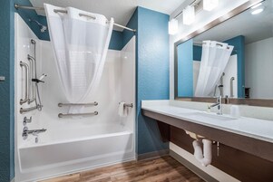 Combined shower/tub, hair dryer, towels, soap