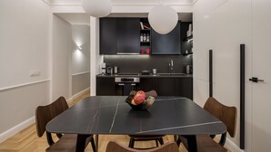 Lägenhet Executive - 1 kingsize-säng med bäddsoffa - bubbelbad - utsikt mot staden | Eget kök | Espressobryggare, kaffe- och tebryggare, stort kylskåp och ugn