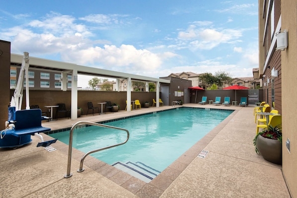 Outdoor pool, open 8:00 AM to 10:00 PM, pool loungers
